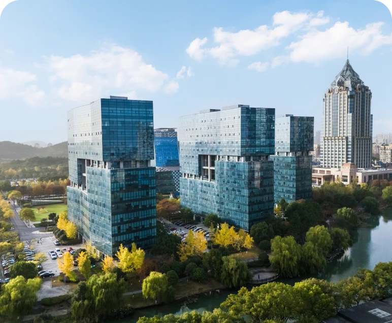 City architecture near a river and trees